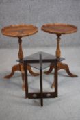 A pair of yew wood wine tables with pie crust edge, together with a glass top occasional table