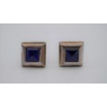 A pair of Quinn silver and lapis lazuli square torpedo cufflinks. Each cufflink set with a sugarloaf