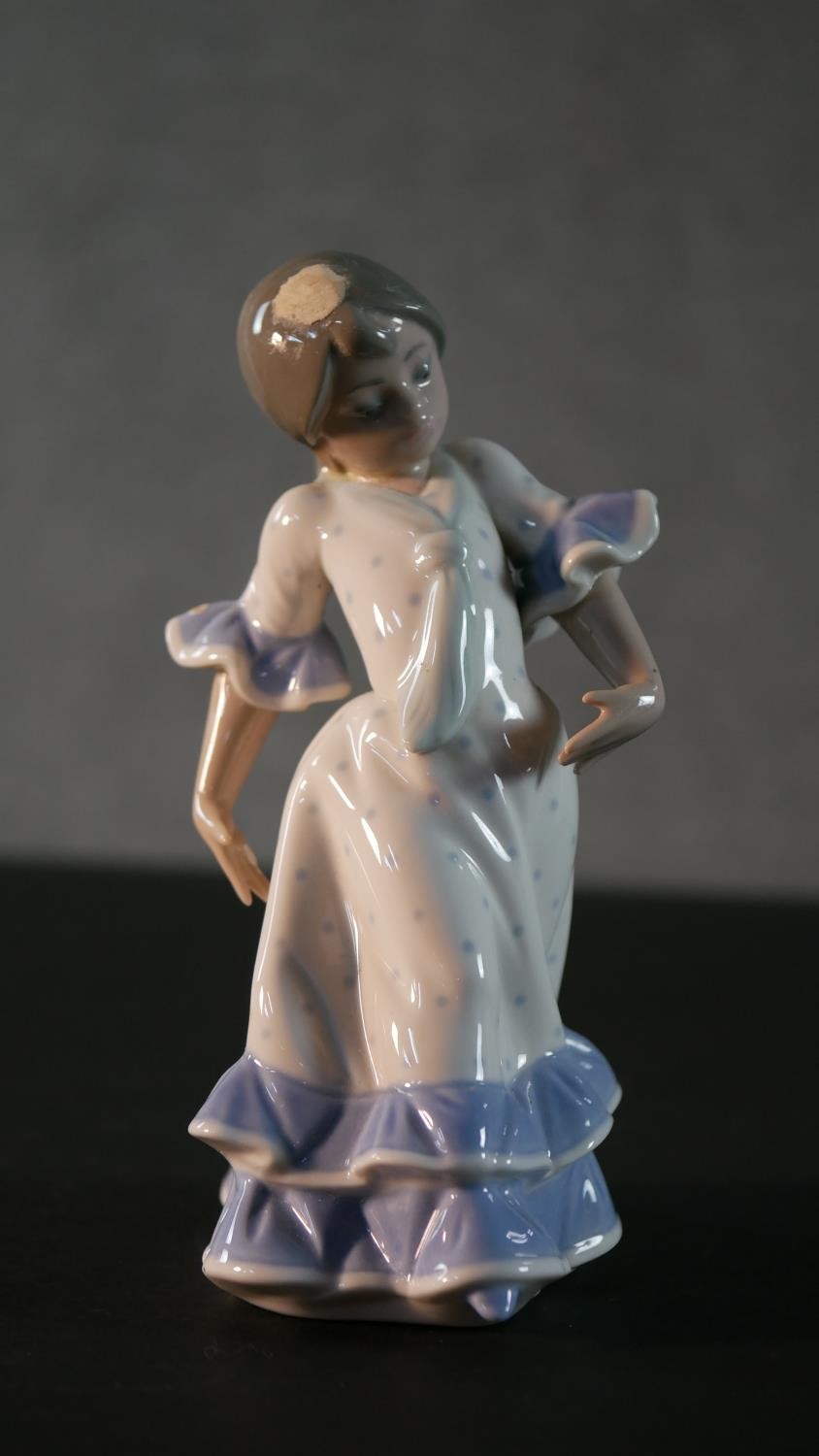 A collection of five Lladro porcelain figures, including a clown and puppy, girl with a lamb, boy in - Image 9 of 14