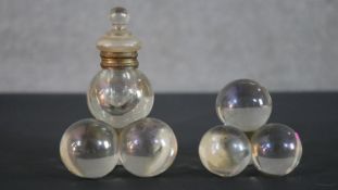 A Victorian globular iridescent glass and brass inkwell and similar paperweight. H.14 W.9cm (