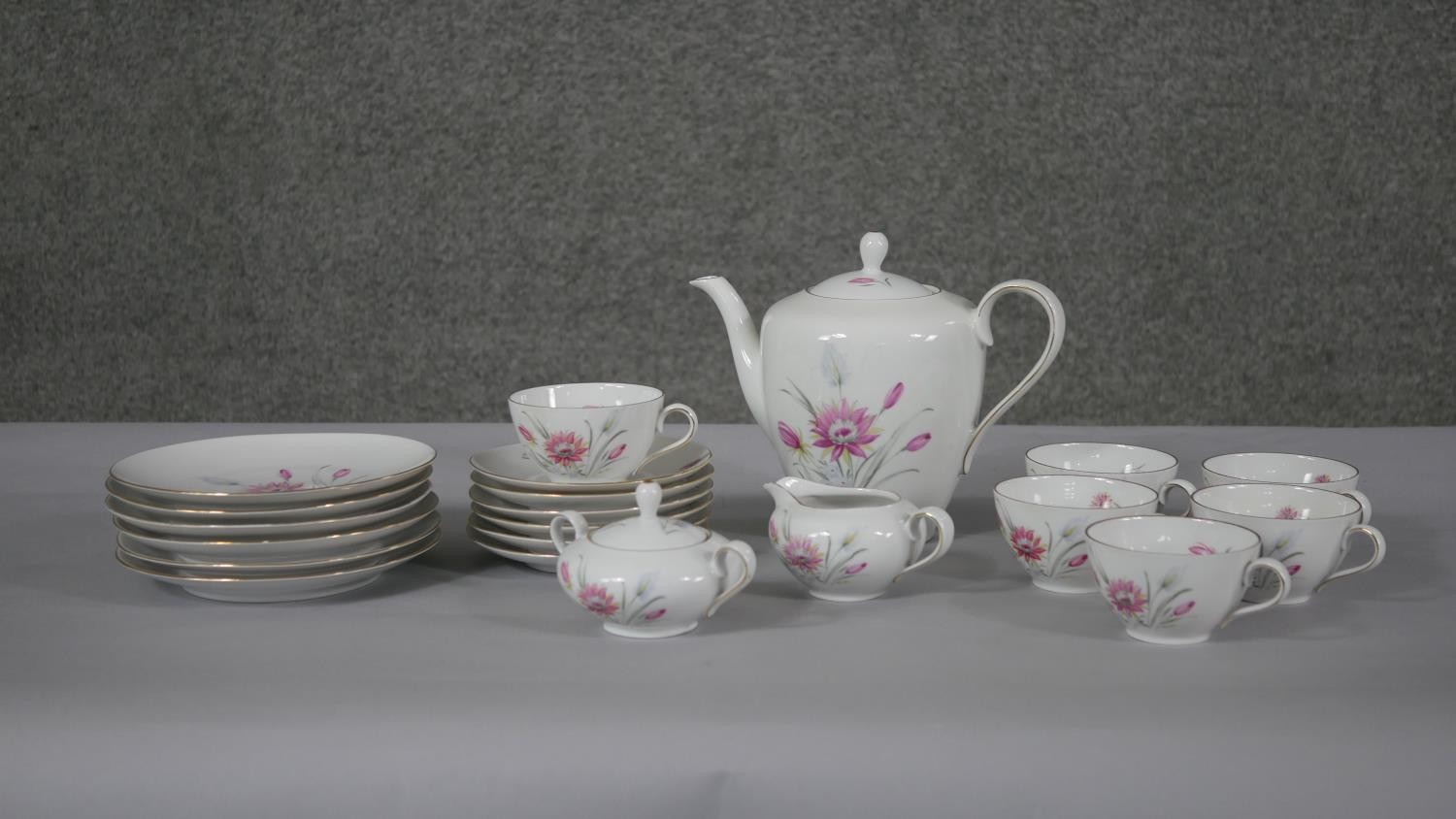 A six person Schumann Bavarian fine china floral design tea set. Makers mark to the base. (21