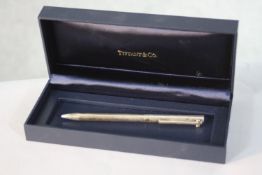 A boxed Tiffany & Co sterling silver executive T-clip ballpoint pen. This pen features a sterling