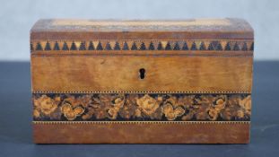 A 19th century lockable Tunbridge ware tea caddy, the domed top lid with a central castle motif