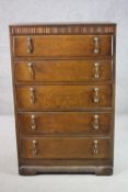 A circa 1910 oak chest of five long drawers. H.110 W.70 D.42cm.