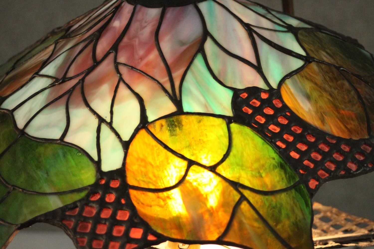 A Tiffany style stained glass table lamp, the shade with foliate design. H.48 W.40cm. - Image 3 of 8