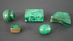 Two miniature malachite trinket boxes, one on four button feet along with a malachite ash tray,
