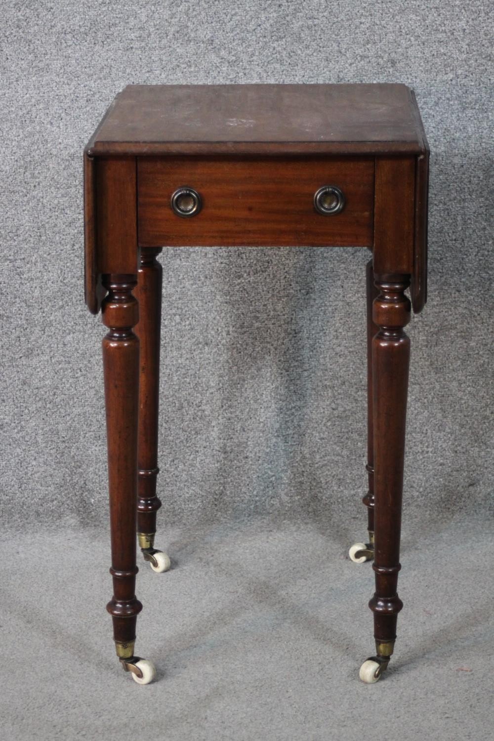A Victorian mahogany work table, the drop leaf top with a moulded edge, over a single drawer, on - Image 2 of 6