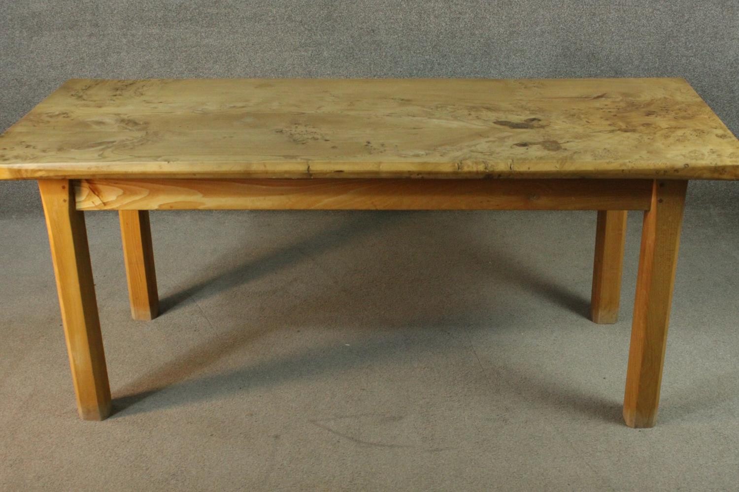 A contemporary burr elm refectory dining table, the rectangular top with chamfered edges on - Image 2 of 7