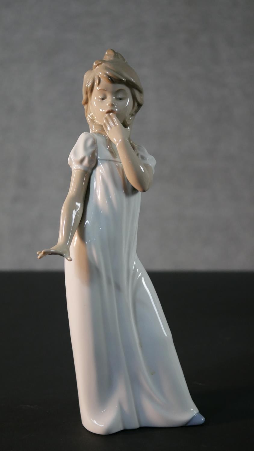 A collection of porcelain figures. Four Nao figures, a girl holding a cake with her dog , a clown, a - Image 9 of 13