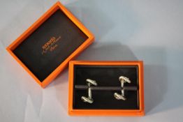 A pair of vintage silver Hermes boxed gentleman's cufflinks. Each cufflink as a rope twist - knot