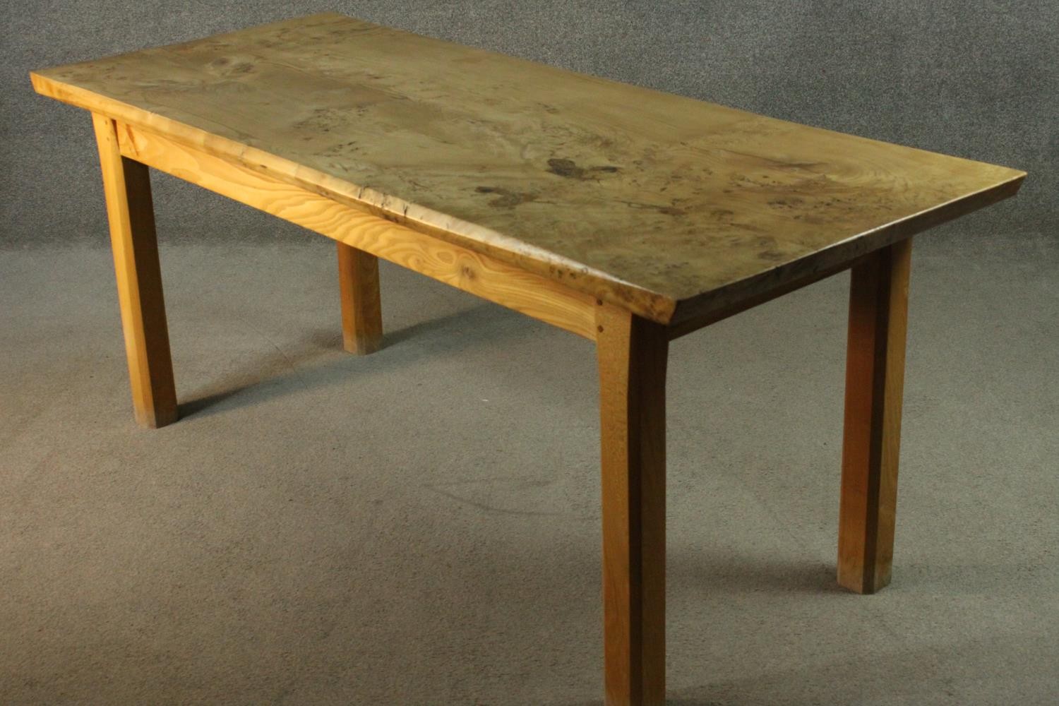 A contemporary burr elm refectory dining table, the rectangular top with chamfered edges on - Image 6 of 7