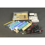 A collection of Rotring pens and drawing leads, including a boxed set of three Rotring pens (0.35,