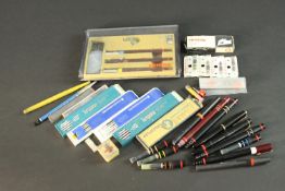 A collection of Rotring pens and drawing leads, including a boxed set of three Rotring pens (0.35,