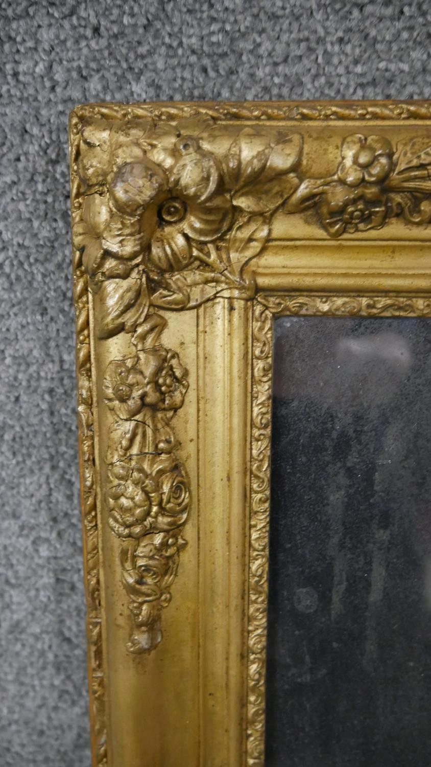 A 19th century gilt framed wall mirror, of rectangular form, the corners decorated with abundant - Image 3 of 5