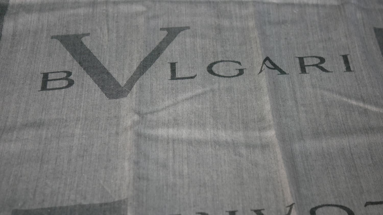 A collection of vintage scarves. One boxed grey branded design Bulgari scarf along with two other - Image 5 of 10