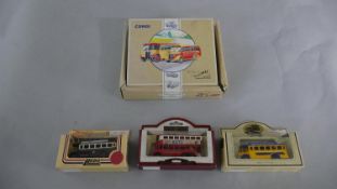 A boxed set of Corgi 'The Buses of Yellow Way' along with three boxed tin plate bus models,