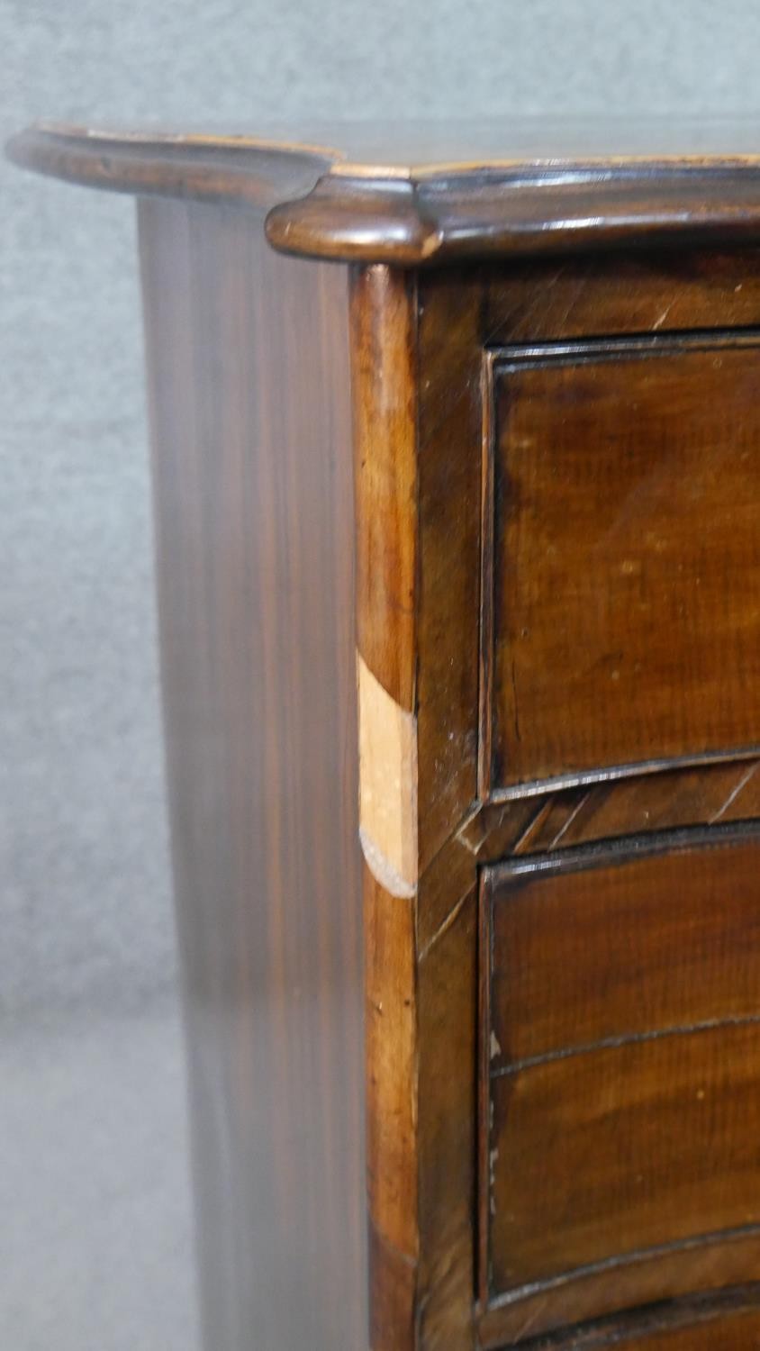 A George III style mahogany serpentine chest, the top crossbanded in satin birch, on four long - Image 6 of 9