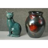 A Poole pottery turquoise glaze cat along with a Poole Pottery Galaxy pattern lustre vase, stamped