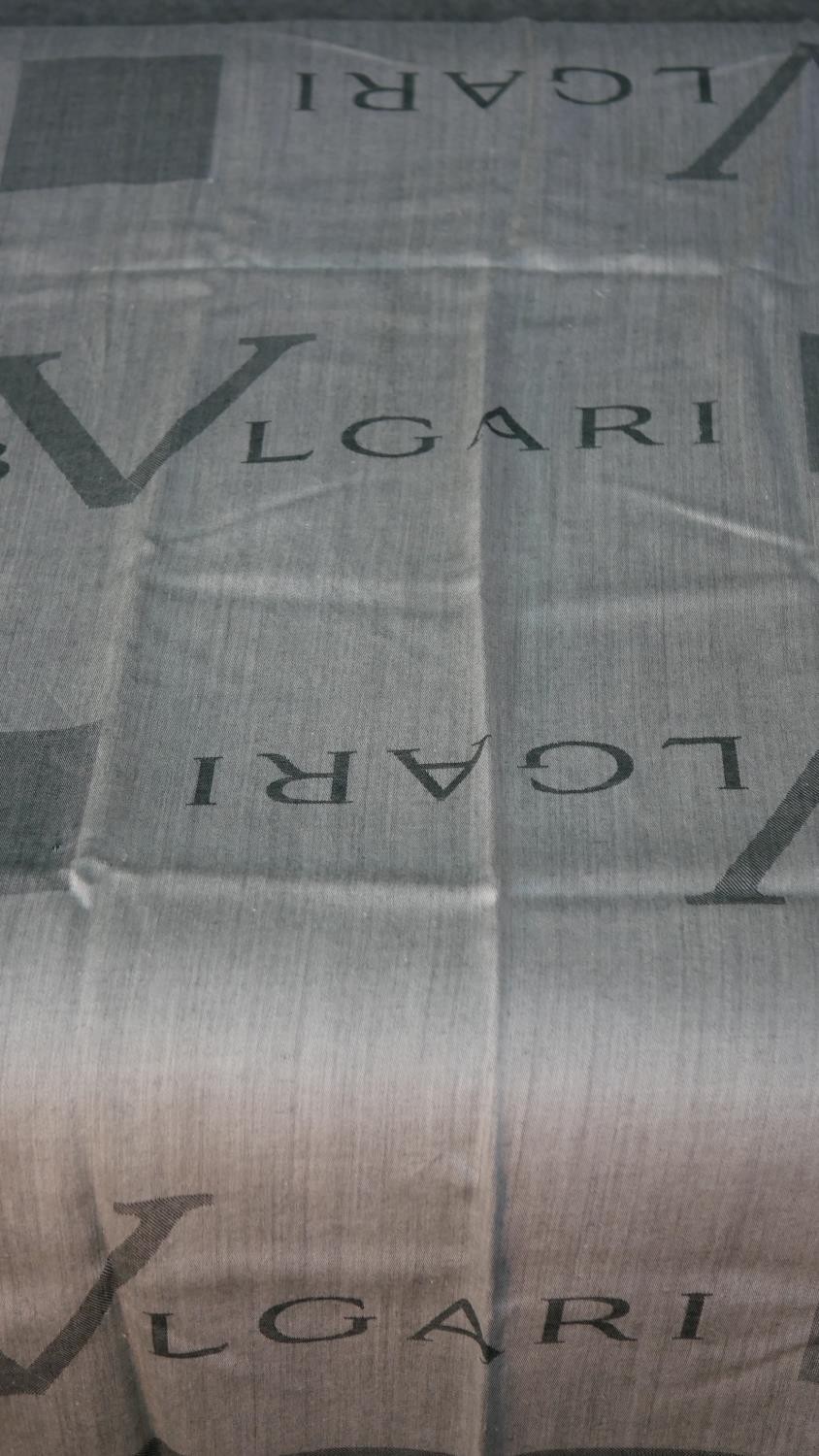 A collection of vintage scarves. One boxed grey branded design Bulgari scarf along with two other - Image 4 of 10