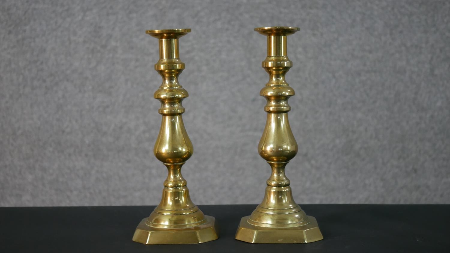 Two pairs of early 20th century brass candle sticks, one set with octagonal bases. H.27.5 W.11.5 D. - Image 2 of 7