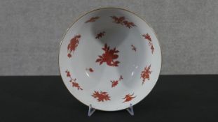 A vintage LJ Kutani style ceramic hand painted bowl decorated with flowers and leaves, makers mark