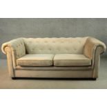 A Som'Toile Chesterfield style two seater sofa bed, upholstered in beige velour.