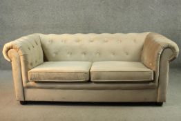 A Som'Toile Chesterfield style two seater sofa bed, upholstered in beige velour.