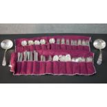 A part set of silver plated cutlery by George Butler Silversmiths. Each with protective cutlery