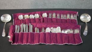 A part set of silver plated cutlery by George Butler Silversmiths. Each with protective cutlery