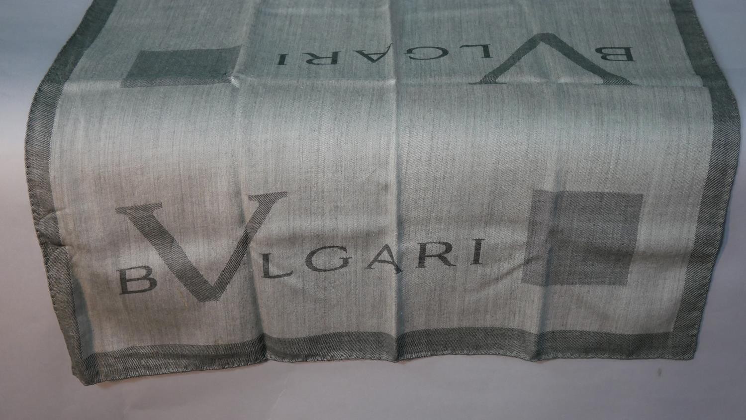 A collection of vintage scarves. One boxed grey branded design Bulgari scarf along with two other - Image 3 of 10