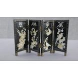 A miniature Japanese mother of pearl and lacquer folding screen. Decorated with birds, cherry