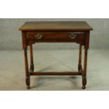 A Titchmarsh & Goodwin oak side table, 18th century style with a single drawer, oon turned legs