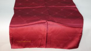 A Must de Cartier vintage monogrammed red silk scarf in original packaging, signed and with makers