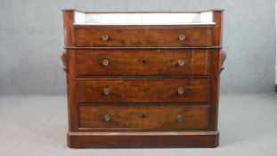 A Victorian flame mahogany dressing chest, with a white marble washstand top, over four long