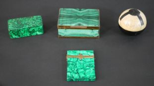 A collection of painted papier mache faux malachite boxes and card cases along with a marble orb