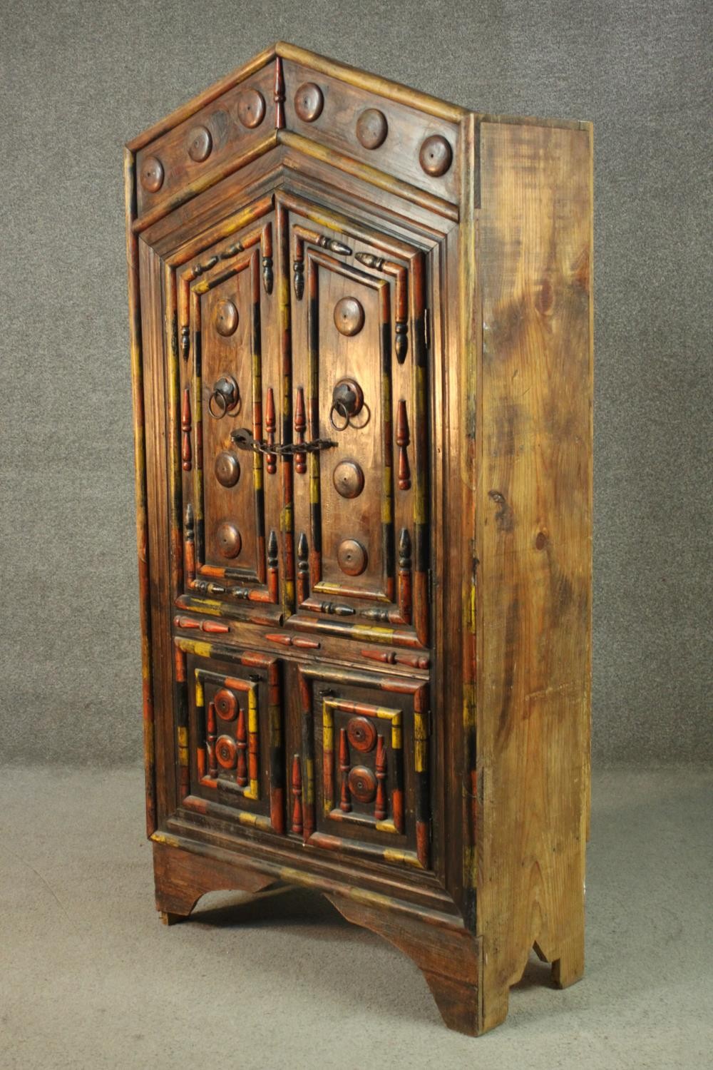 An Indian polychrome painted hardwood cupboard, with an arch top over two pairs of cupboard doors, - Image 2 of 7