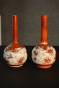 Two 19th century Japanese Kutani ceramic bottle vases, hand painted with birds and flowers,