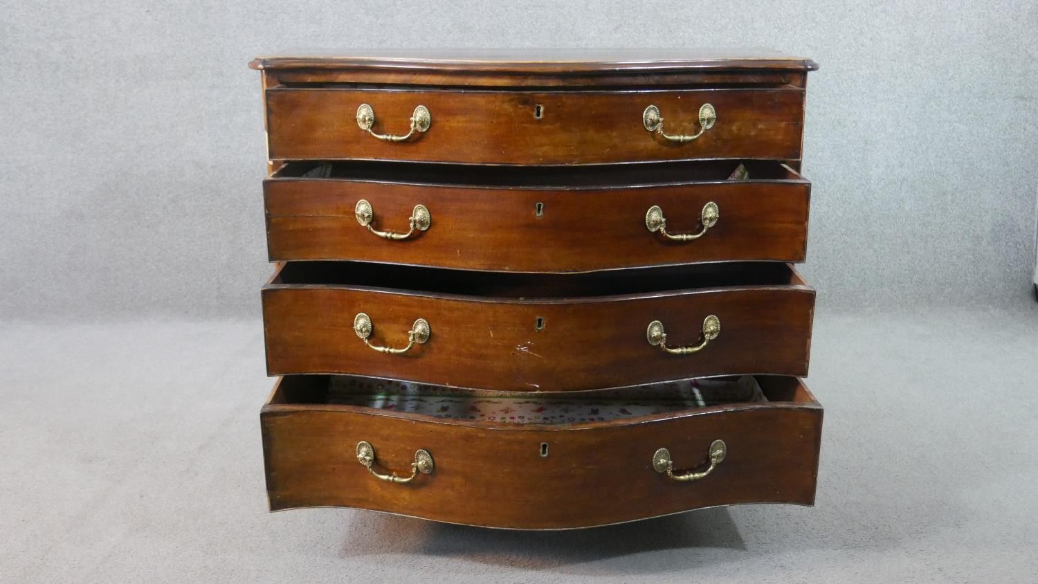 A George III style mahogany serpentine chest, the top crossbanded in satin birch, on four long - Image 2 of 9