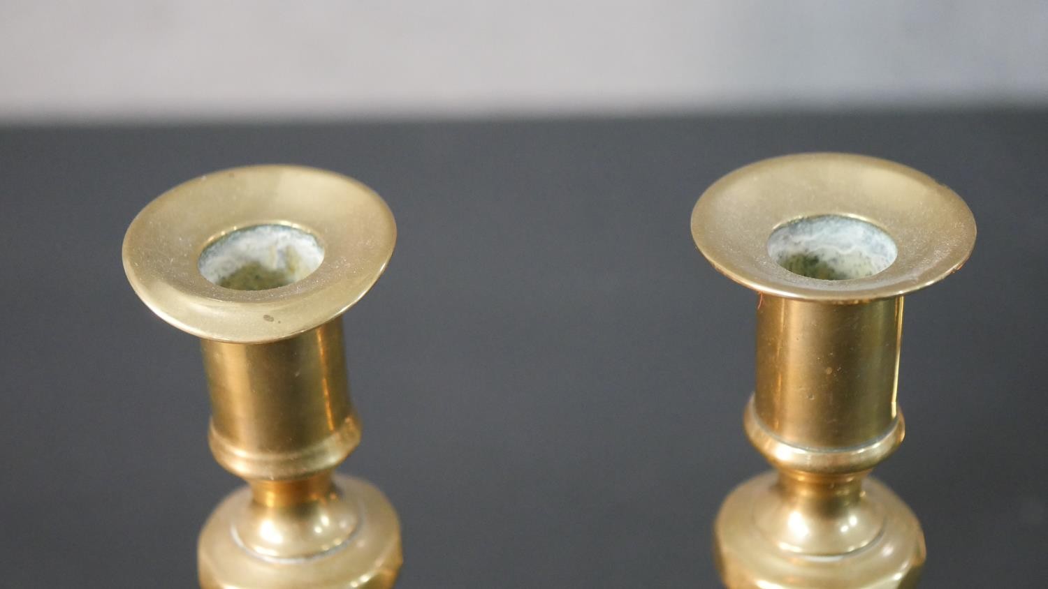 Two pairs of early 20th century brass candle sticks, one set with octagonal bases. H.27.5 W.11.5 D. - Image 6 of 7