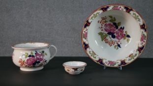 An early 20th century Camellia design Wedgwood wash bowl and jug with shaving bowl. Diam.40cm (
