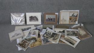 A large collection of antique postcards and photos, various subjects, including a set of black and