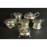 Six 19th and 20th century sterling silver hinged lid mustard pots, various designs, makers and assay