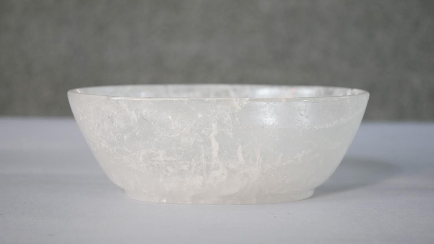 A carved rock crystal oval bowl. H.6 W.17.5 D.13cm