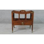 A George III mahogany Canterbury, with a central handle and four divisions over a single drawer,