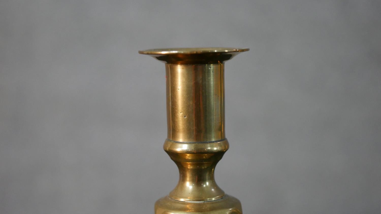 Two pairs of early 20th century brass candle sticks, one set with octagonal bases. H.27.5 W.11.5 D. - Image 7 of 7