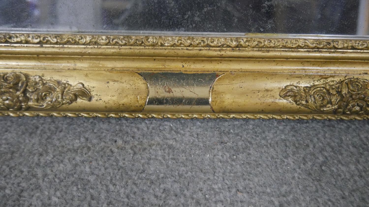 A 19th century gilt framed wall mirror, of rectangular form, the corners decorated with abundant - Image 4 of 5