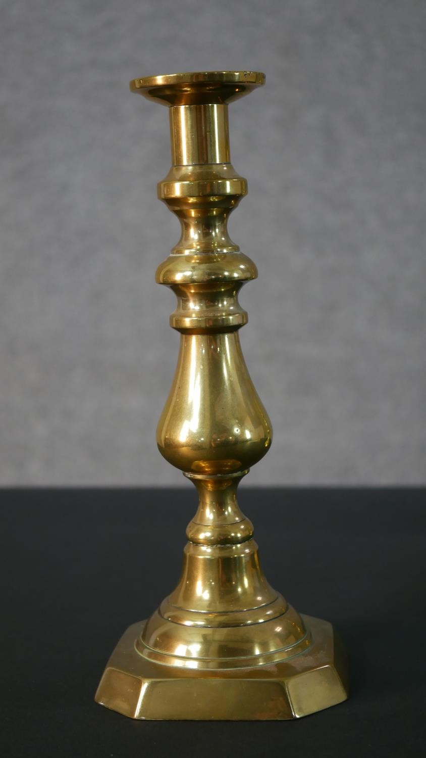 Two pairs of early 20th century brass candle sticks, one set with octagonal bases. H.27.5 W.11.5 D. - Image 3 of 7