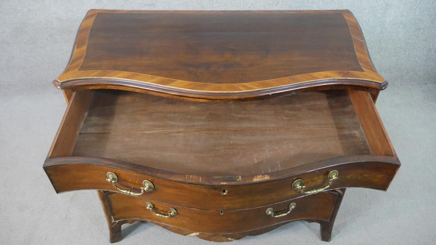 A George III style mahogany serpentine chest, the top crossbanded in satin birch, on four long - Image 3 of 9