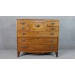 A George IV mahogany chest, with a central hat drawer, flanked by two pairs of short drawers, over