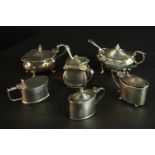 Six 19th and 20th century sterling silver hinged lid mustard pots, various designs, makers and assay